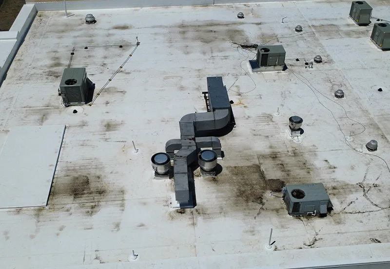 Aerial view of a new commercial roof.