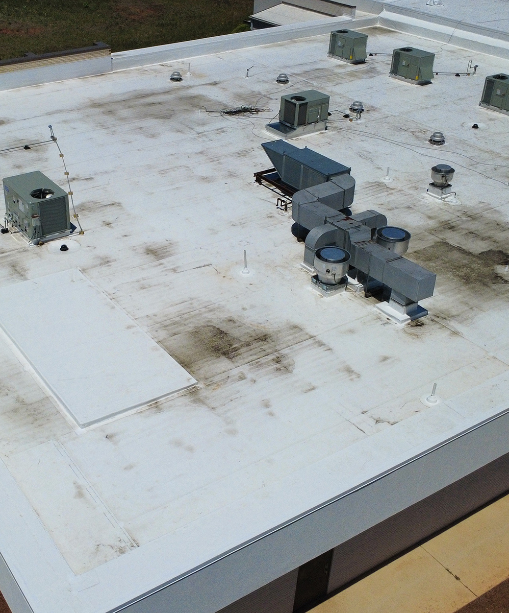 Aerial view of a new commercial roof.