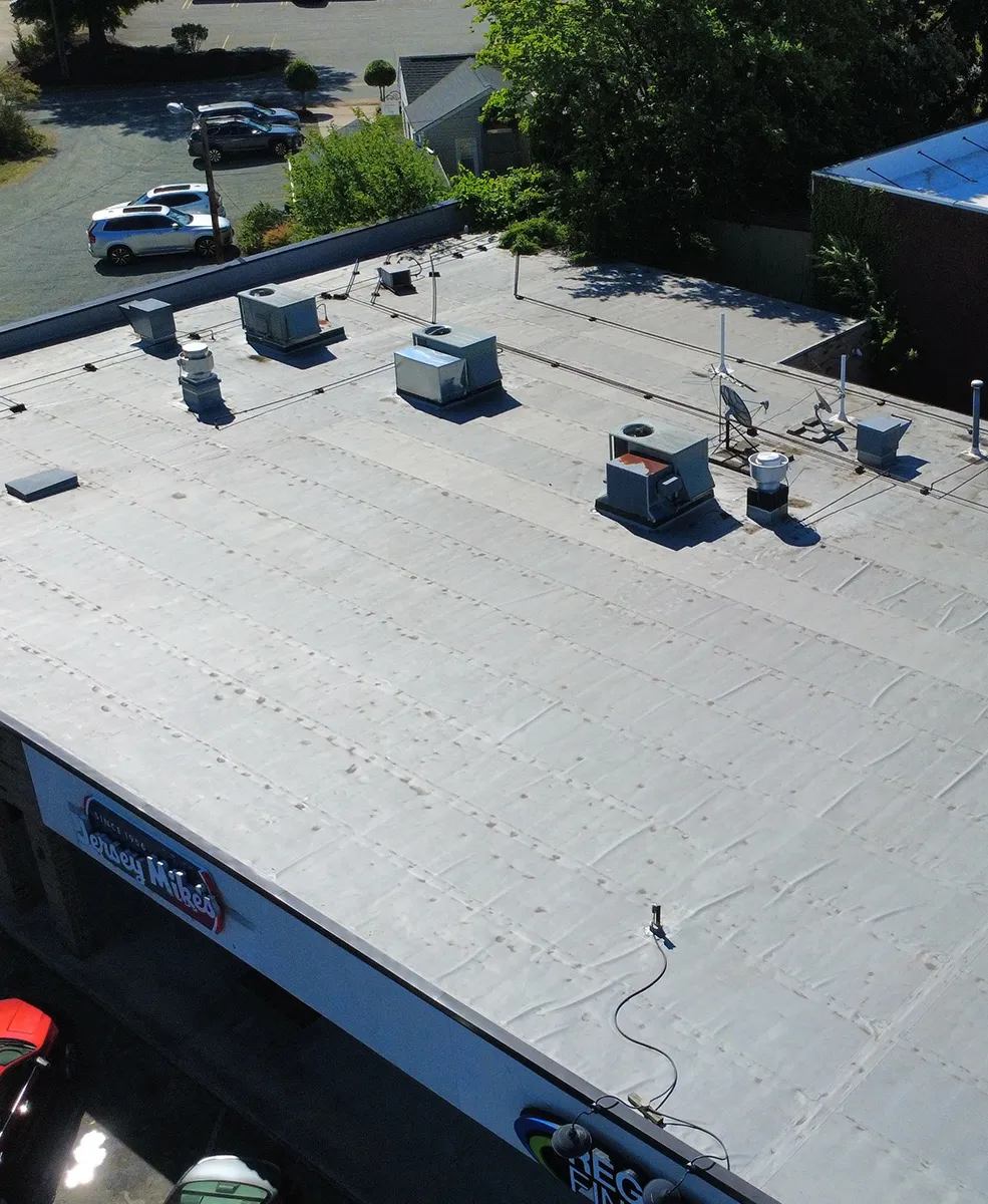 Aerial view of a new commercial roof.