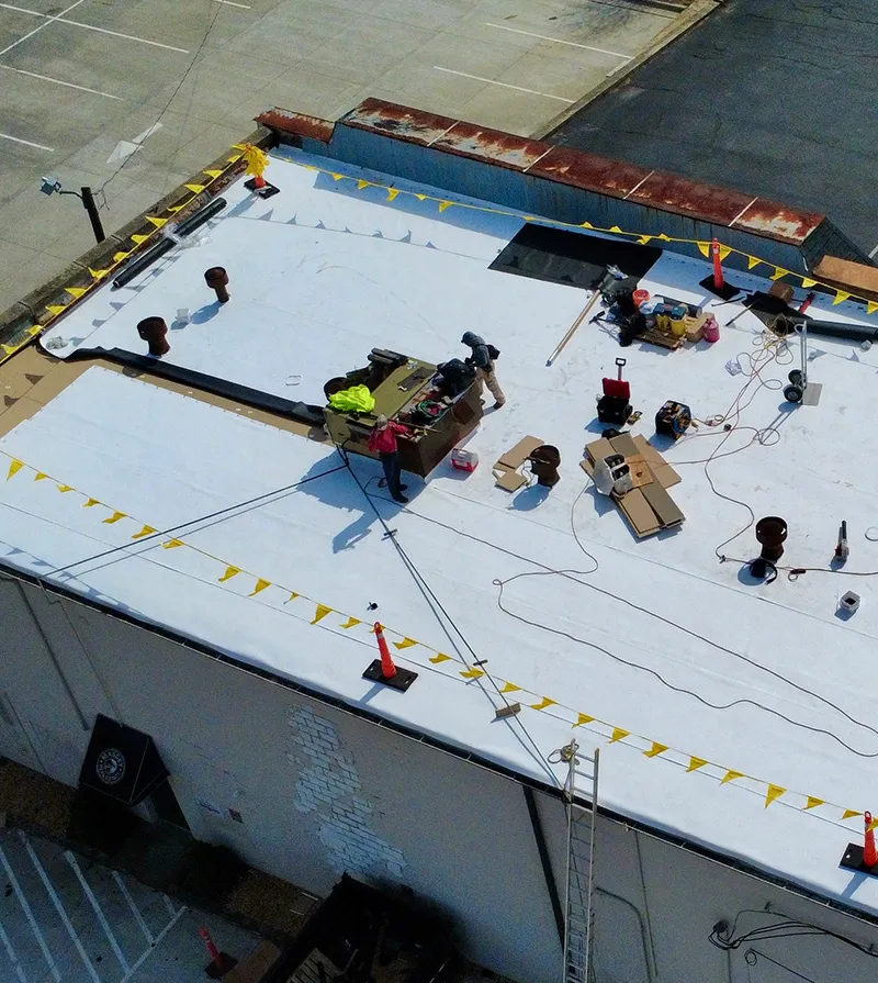 Aerial view of a new commercial roof.